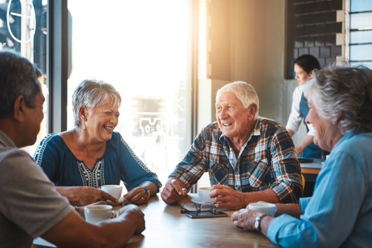 Senior drinking coffee