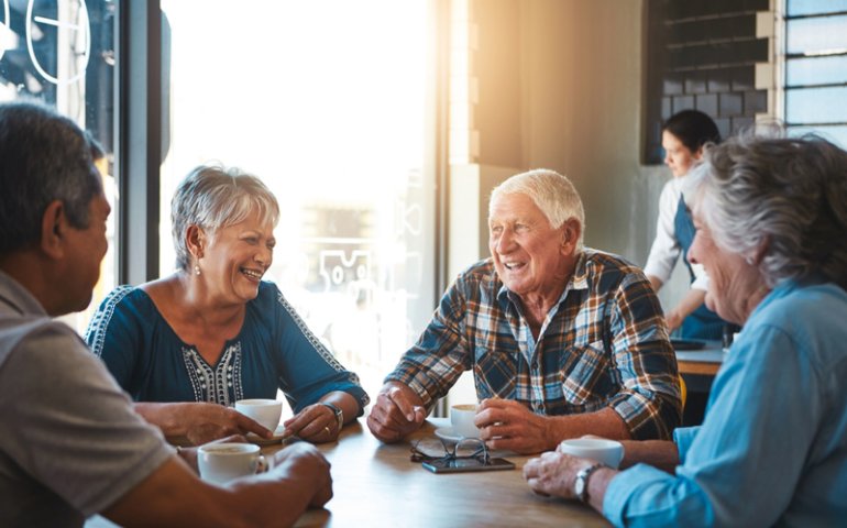 Senior drinking coffee